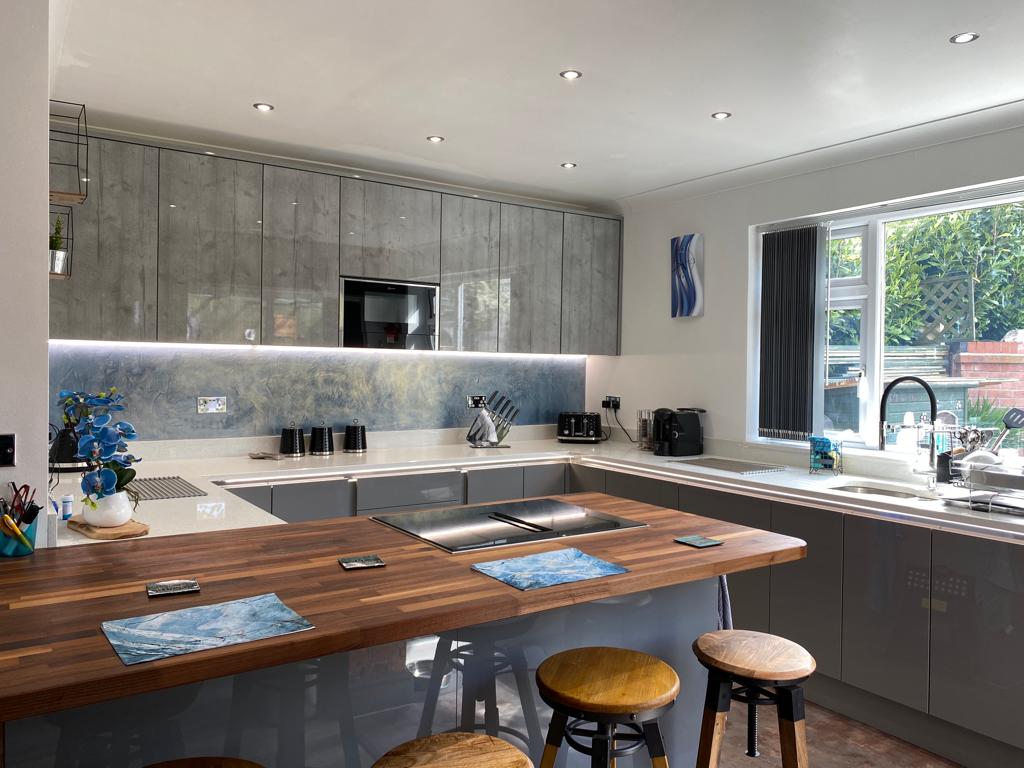 Dark shaker kitchen with quartz island fitted by Quick Fix Kitchens